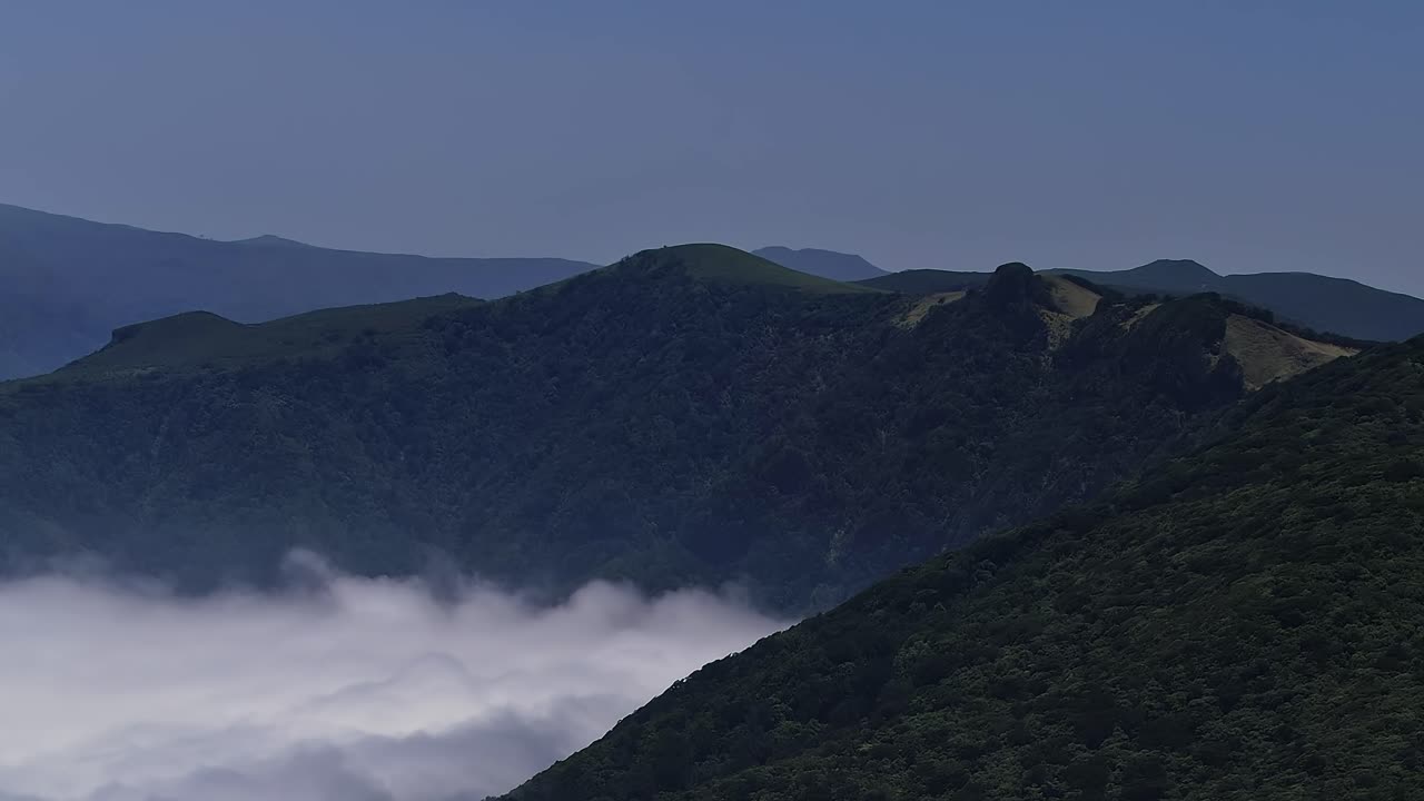 Stunning aerial view of Madeira landscape with clouds below