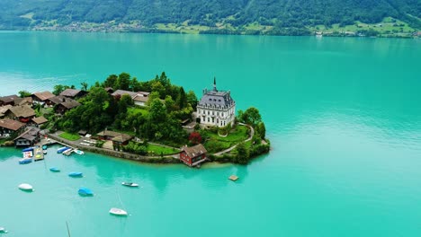charming villa on swiss island - vibrant alpine views over turquoise lake, drone