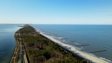 aerial of bay with beach and highway