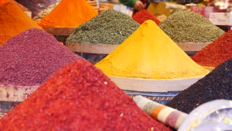 colorful spices on display at a market stall