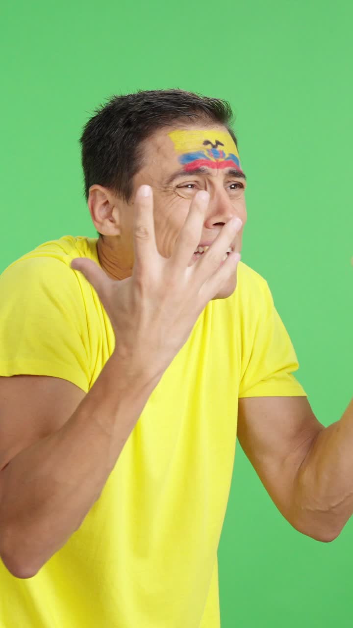 Man cheering for Ecuador, angry with the decision of referee