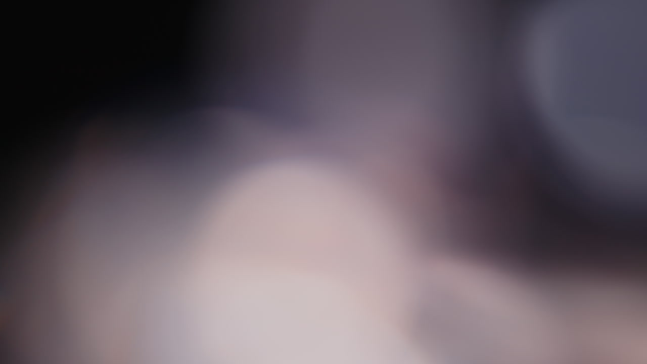 Multicolored light leaks 4k footage on black background stylizing video transitions bokeh effect