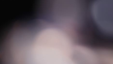 multicolored light leaks 4k footage on black background stylizing video transitions bokeh effect
