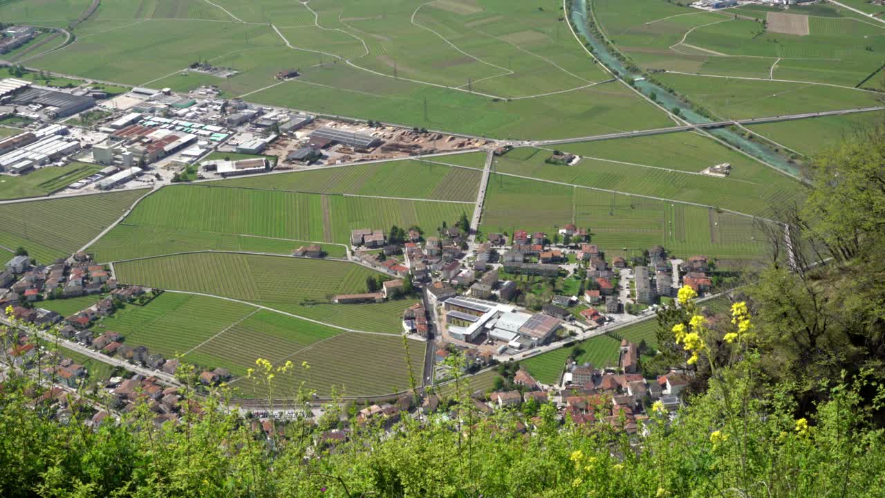 View from above of part of Mezzocorona, Trentino, Italy on a sunny day