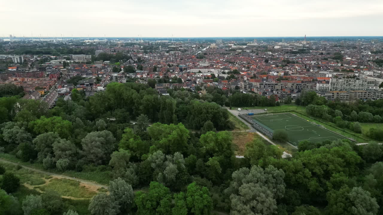 Aerial View of Soccer Field Surrounded by Trees Between Bourgoyen-Ossemeersen and Rooigem in Ghent