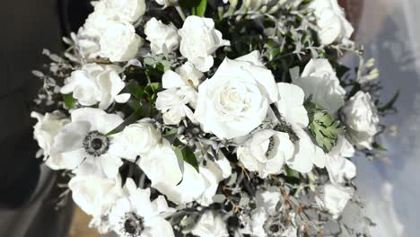 Beautiful-Wedding-Bouquet,-White-Flowers,-Pull-Back-Shot