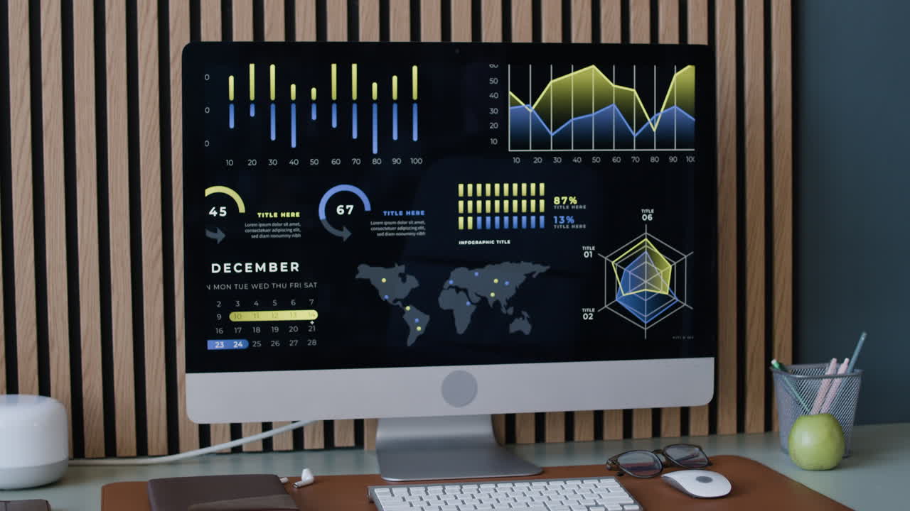 Modern Workspace with Computer Displaying Data Visualizations