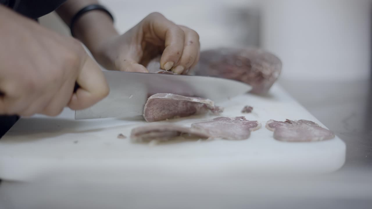 Chef Preparing Sliced Beef Tongue