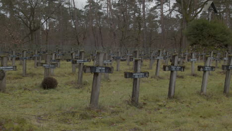 old and dirty crosses at abandoned cemetery