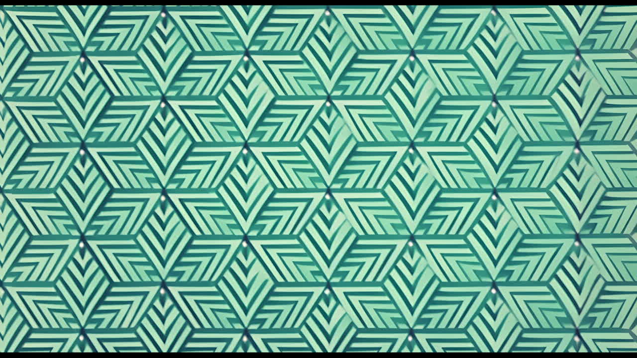 黒い背景で動く緑色の形状のアニメーション