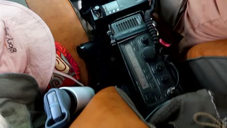 View-of-a-communication-radio-installed-in-a-4x4-safari-vehicle-while-driving