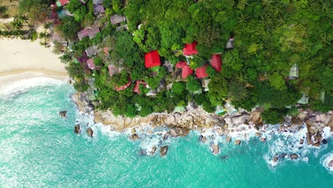 colorful roofs of the bungalows on the cliff edge of koh phangan