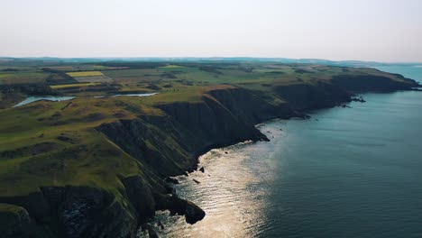 Scotland's-Aerial-Tapestry:-St-Abbs-Head,-Scottish-Coastline-Beauty,-Scotland's-Cliff-Landscape