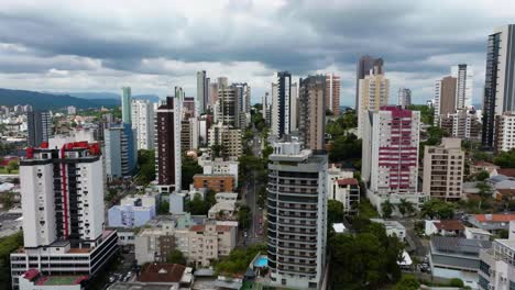 aerial view of colorful apartment buildings, daytime in cloudy porto alegre, brazil