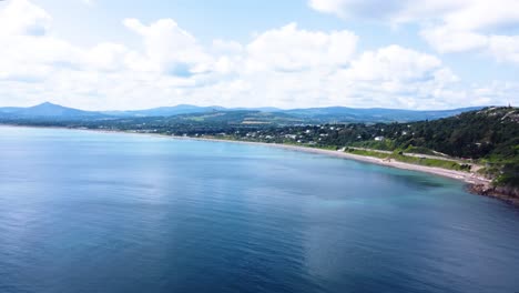 Aerial-Orbiting-Shot-of-over-a-Beautiful-Irish-Coastline