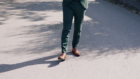 stylish man's lower half in dress pants and leather shoes