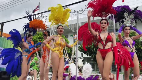 colorful parade performers in traditional costumes