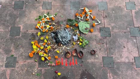 prasad offered to lord sun during chath puja with diya's and incense sticks lit.