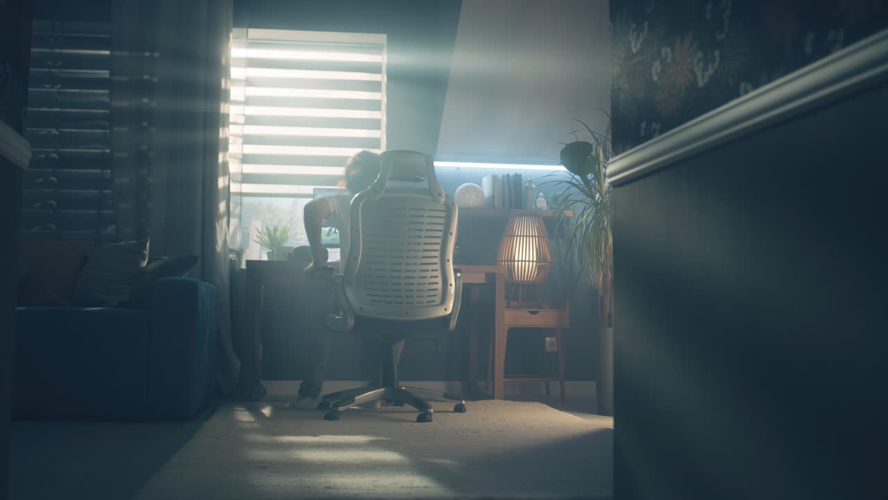 Person Working From Home in a Cozy Bedroom Office