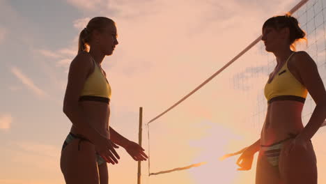 Close-up-of-volleyball-players-hands-clapping-and-clapping.-The-joy-of-victory.-Volleyball-players-celebrate-a-goal.