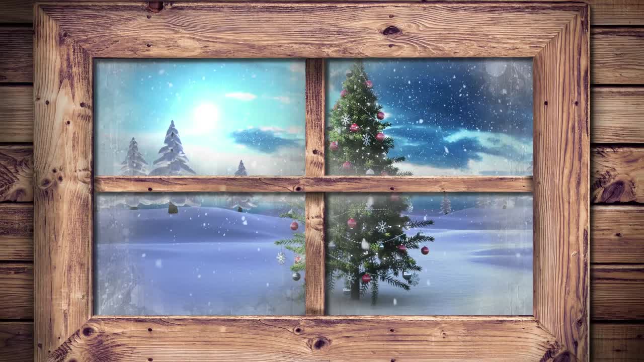Wooden window frame against snow falling over christmas tree on winter landscape