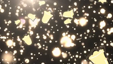 múltiples iconos de campanas de navidad cayendo contra manchas doradas de luz sobre un fondo negro