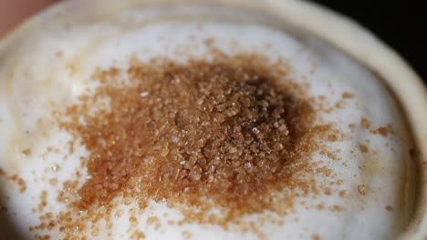 close-up of sugar on cappuccino foam