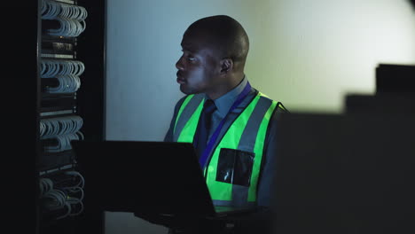 Man, electrician and computer in server room
