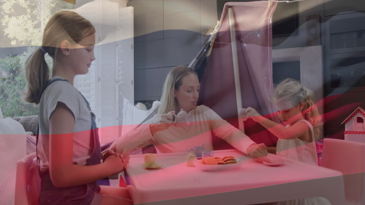 Mother and daughters having tea party over Russian flag animation