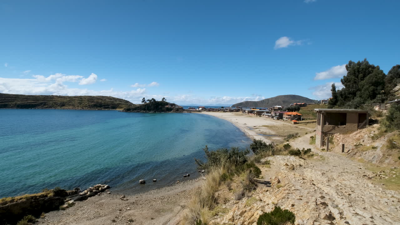 Ch'allaxa Beach in Challapampana on Isla del Sol, Copacabana, Bolivia. Tranquil beach, clear waters of Lake Titicaca, and the scenic beauty of this sacred island