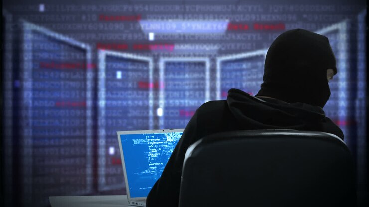 Composite video of hacker using laptop