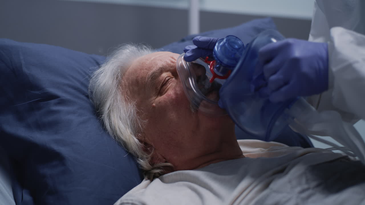 Elderly Patient Receiving Oxygen Therapy in Hospital