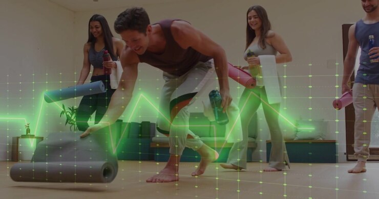 Vertical video: Four adults entering, lead placing mat, others preparing yoga with waveform grid