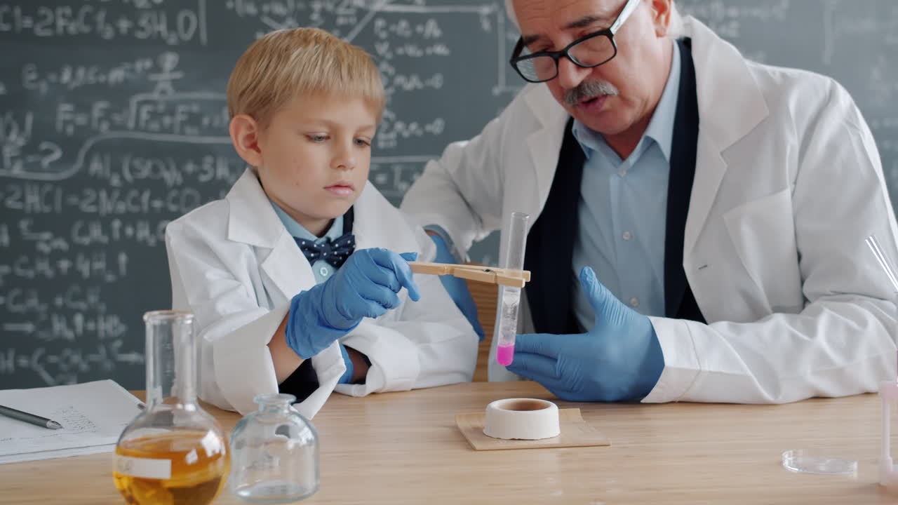 Boy and Teacher in Science Lab