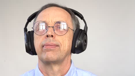 happy older man listening to music