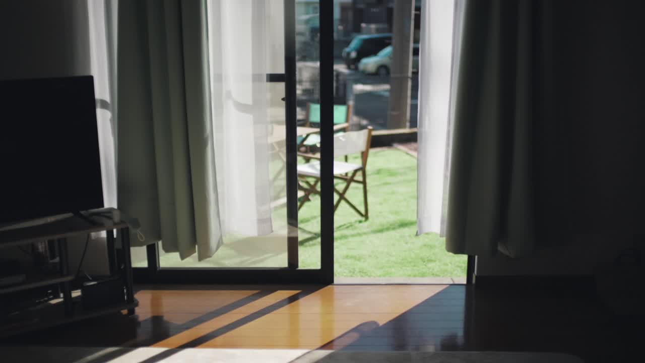 Morning Sun Shining Through The Glass Window With White Curtain.  - wide shot