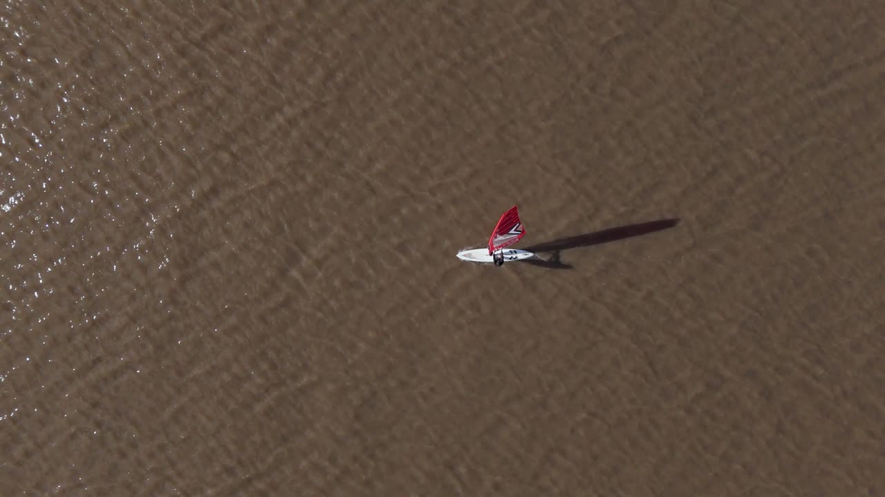 Aerial view of windsurfer on Rio De La Plata, Argentina, enjoying freedom