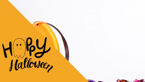 Animation-of-happy-halloween-text-over-basket