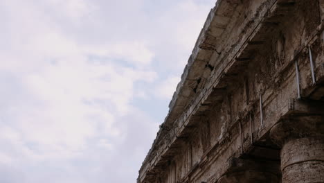 ancient ruins under cloudy sky