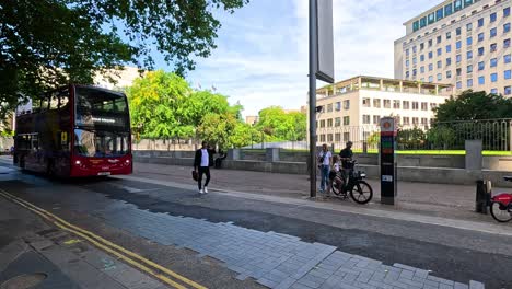 tour bus and pedestrians in london