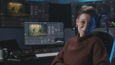 female video editor at work