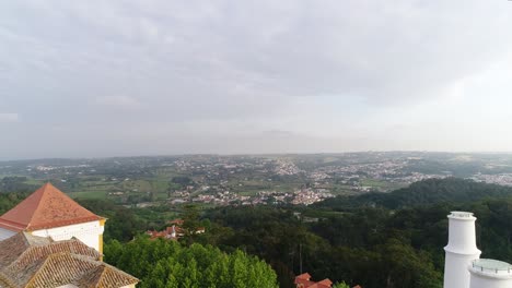 National-Palace-In-The-Historical-Town-Of-Sintra,-Portugal---aerial-drone-shot