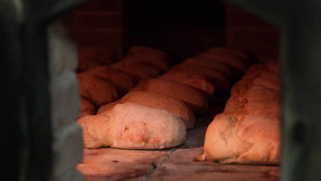 Loaves-Of-Bread-Being-Cooked-Inside-The-Traditional-Oven-In-The-Bakery