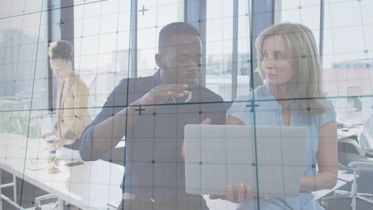 Business team collaborating, woman ending call and tapping phone while man gesturing scale on grid
