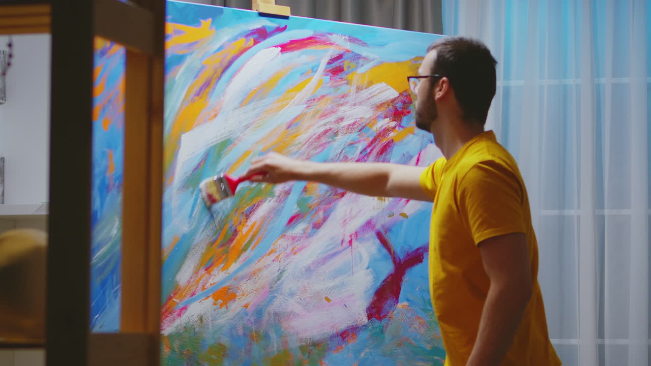 Artist working on painting