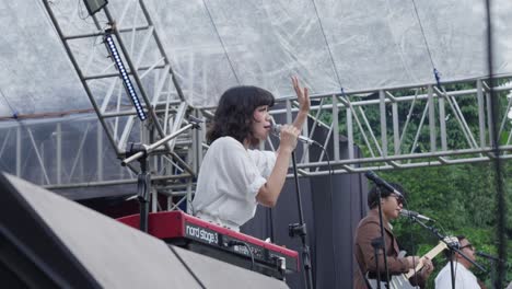 "reality club" music group performs on stage in bogor, indonesia.