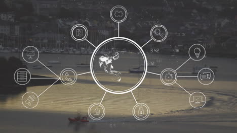 network of interconnected icons animation over serene waterfront town scene