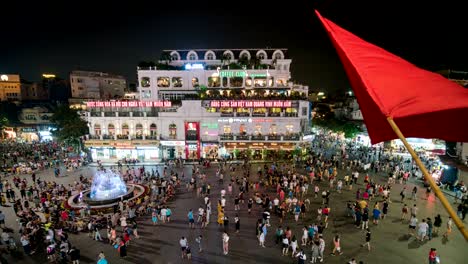 hanoi : vietnam : october 12, 2019 : time lapse crowd of people shopping walking along street at roundabout at old quarter in weekend, hanoi, vietnam.