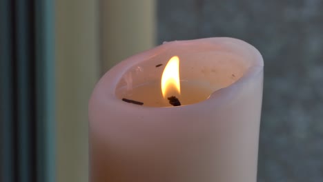 Shot-of-Flower-and-candle-used-for-a-funeral