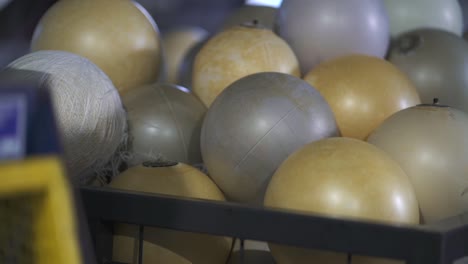 semi-finished balls are waiting on the loading bay for the next steps in the factory